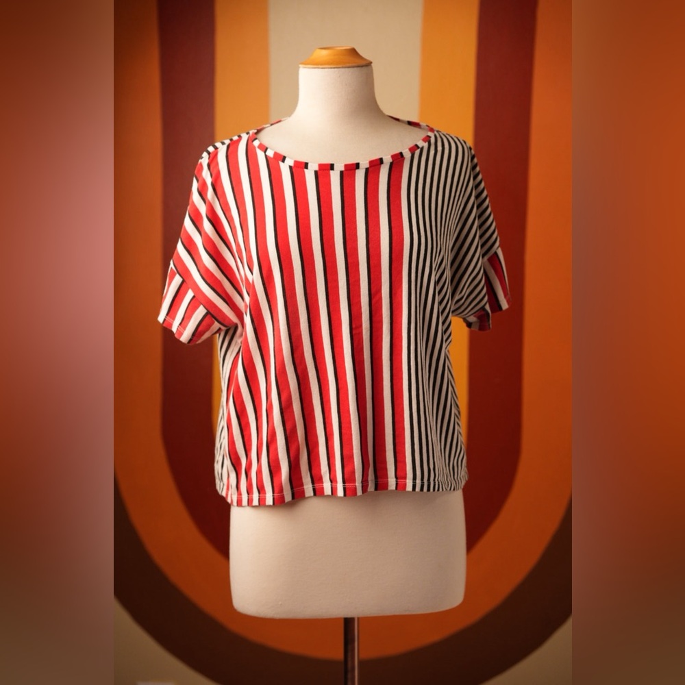 Split color and pattern striped red and black tee shirt